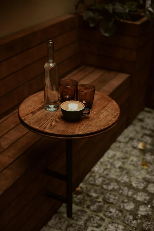 a wooden table with some brown bowls on it