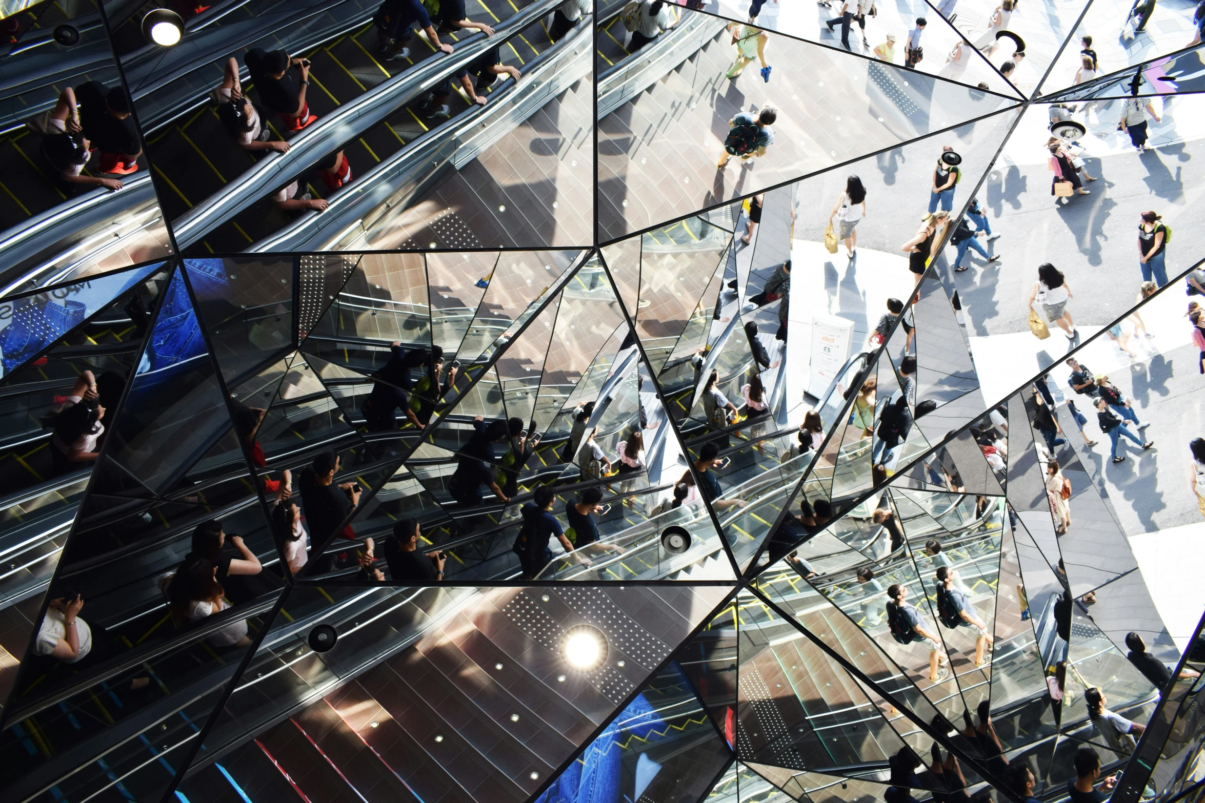 an aerial view of the escalator and the city skyline