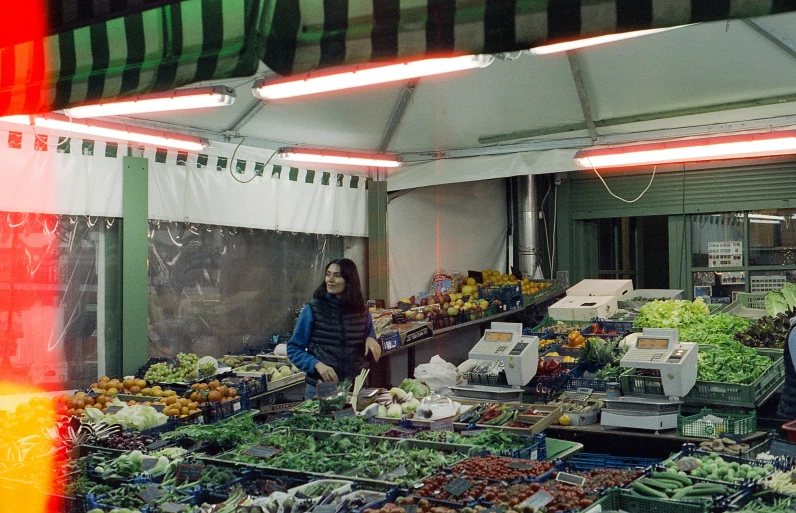 the people are shopping in the market place