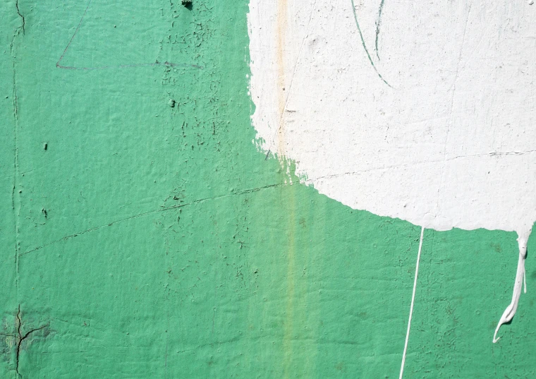 two colors of white and green are painted on the wall