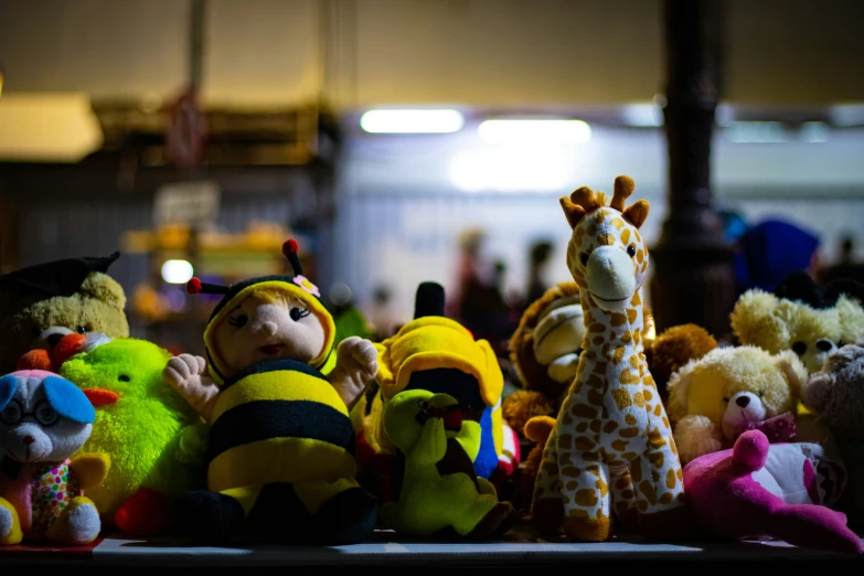 a group of stuffed animals sitting in front of each other