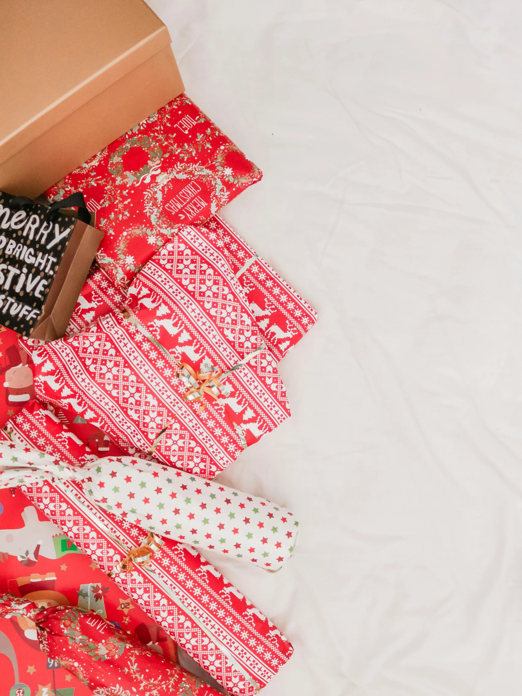 a small box sitting open on top of a bed