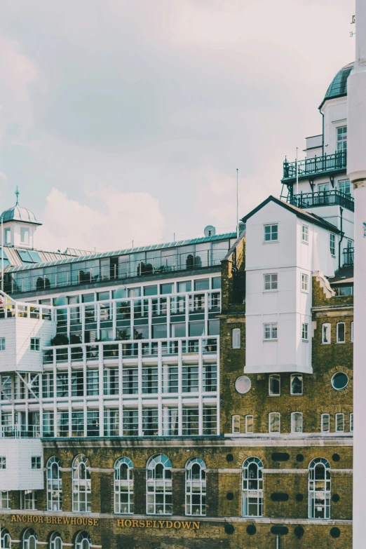 some large buildings in a big city with a lot of windows