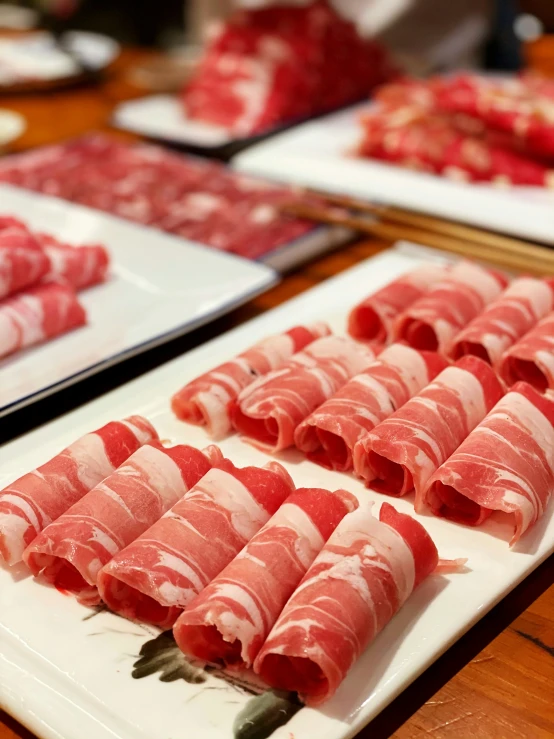 a number of foods on plates on a table