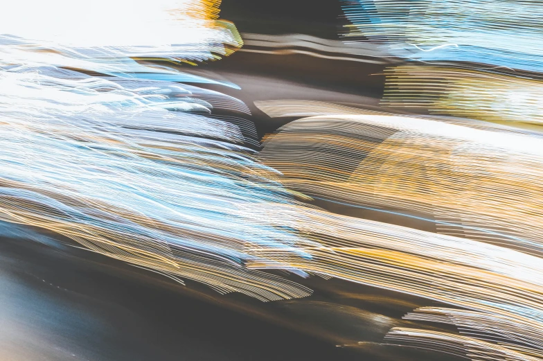 a motion blurred pograph of books stacked together