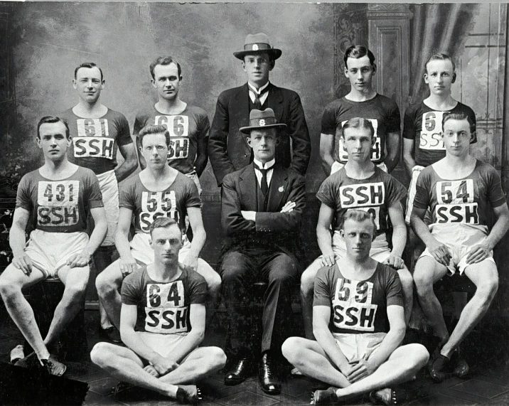 vintage po of men in different uniforms posing for po