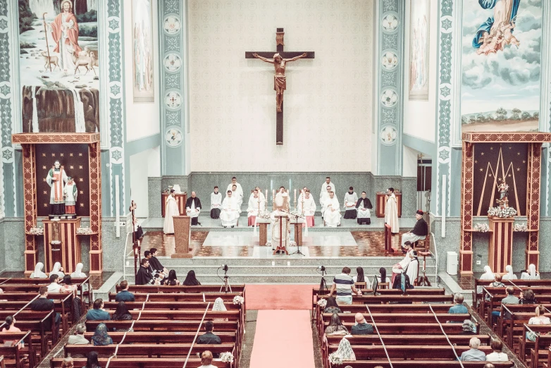 church with pews and people on the steps