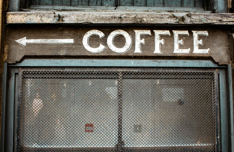 sign on the wall explaining the direction of coffee