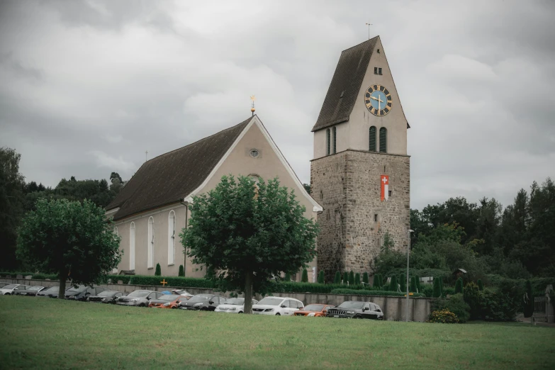 there are cars parked near a church