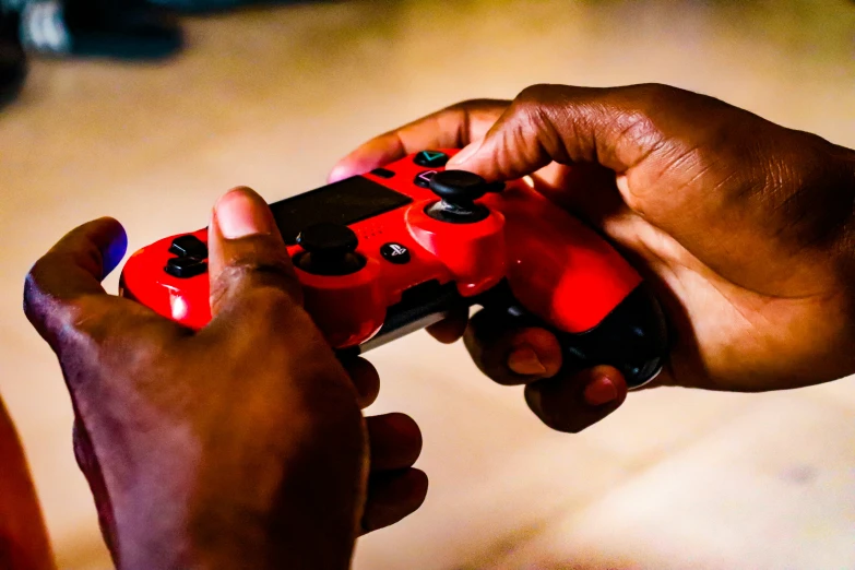 a person is playing a video game using the controller