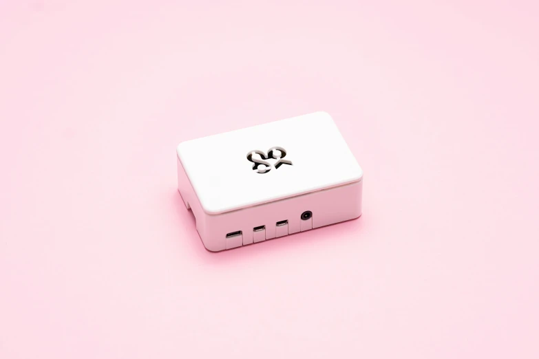 a pink and white box with a skull on it