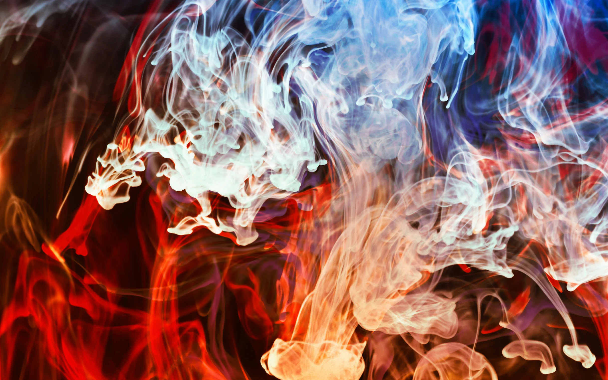 a group of white and red smoke sticks