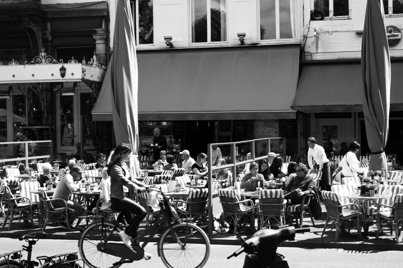 a black and white po of people on bikes