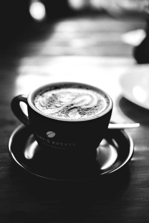 a cup of coffee sitting on top of a saucer