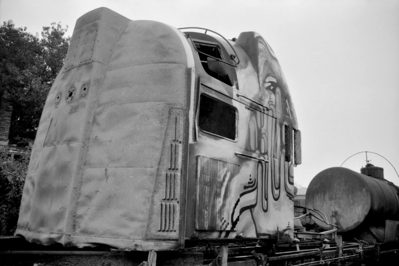 an old train that is parked on a track