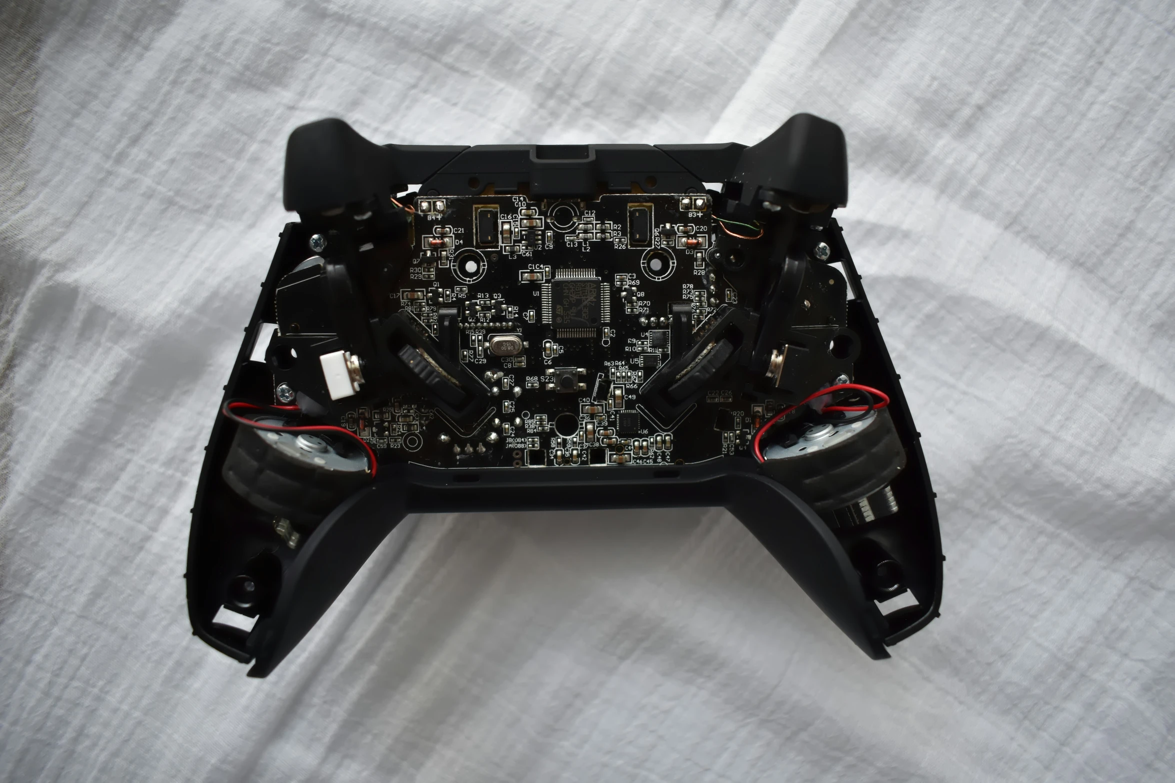 an image of a video game controller showing wires