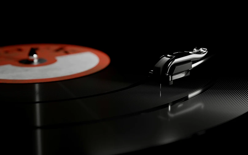 a black turntable with the rest of it sitting on a reflective surface