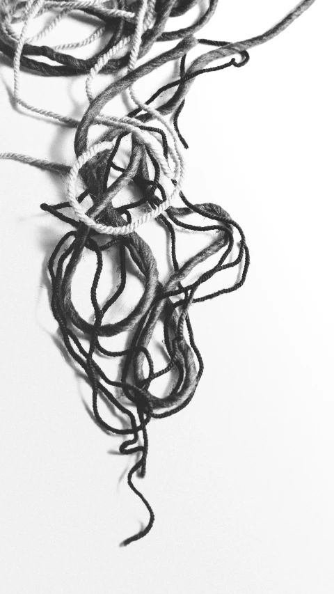 string is woven with the help of a cord