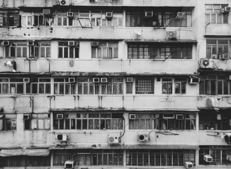 black and white pograph of multiple buildings and balconies