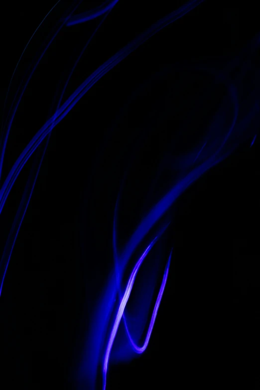 a group of blue abstract lights on black background