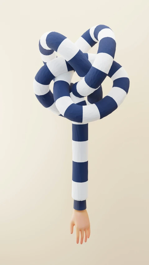 hand holding a giant balloon with blue and white striped ribbons