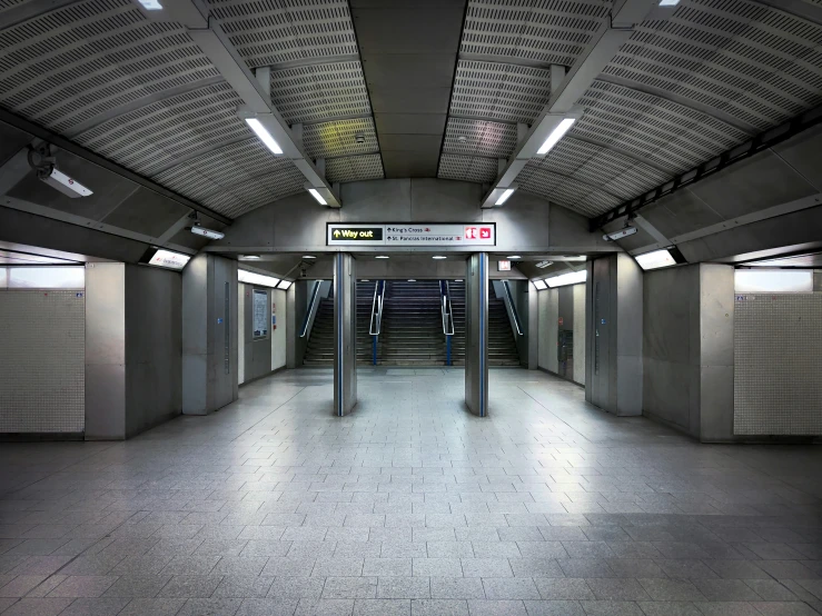the empty subway station is in the evening light