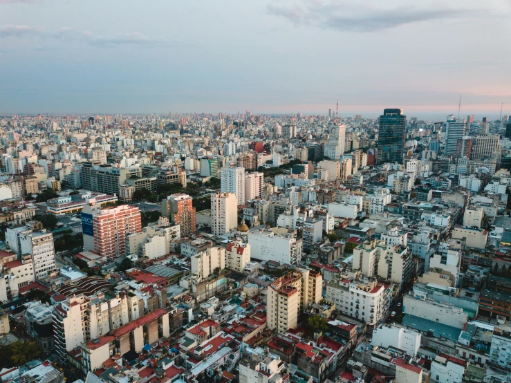 an aerial view of city buildings and many other tall buildings