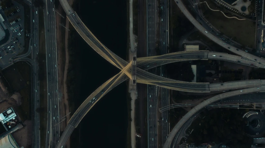 an aerial view of several roads in the night