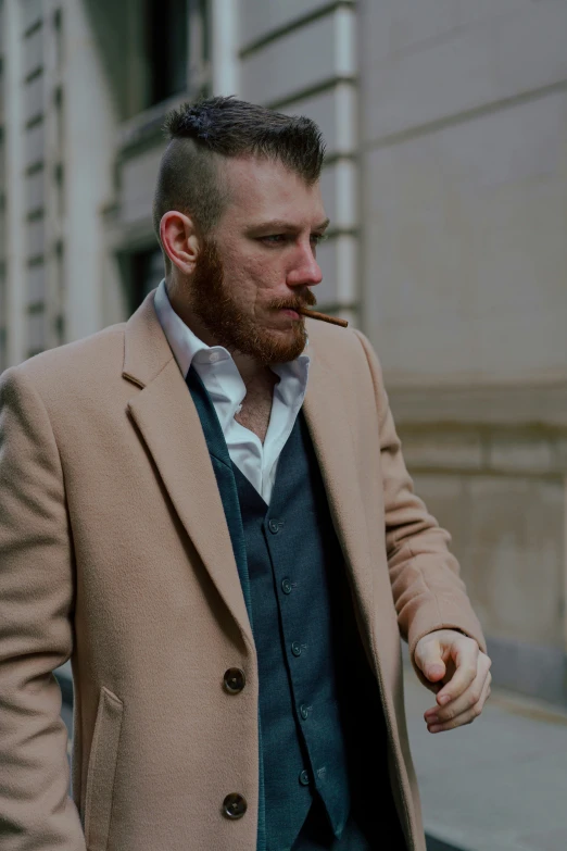 a man smoking a cigarette while walking down the street