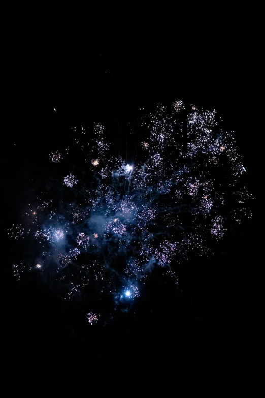 a blurry image of fireworks at night