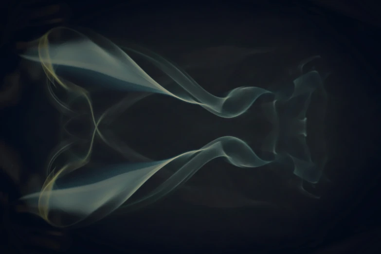 some white smoke going down into a black background