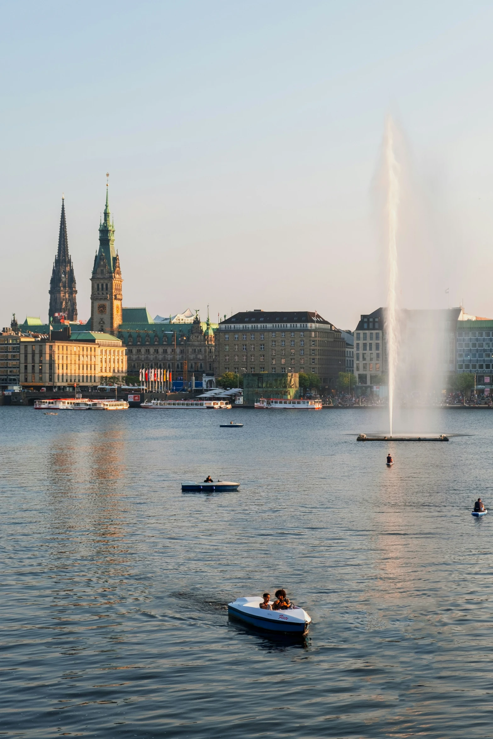 there are boats that have water spray in the air