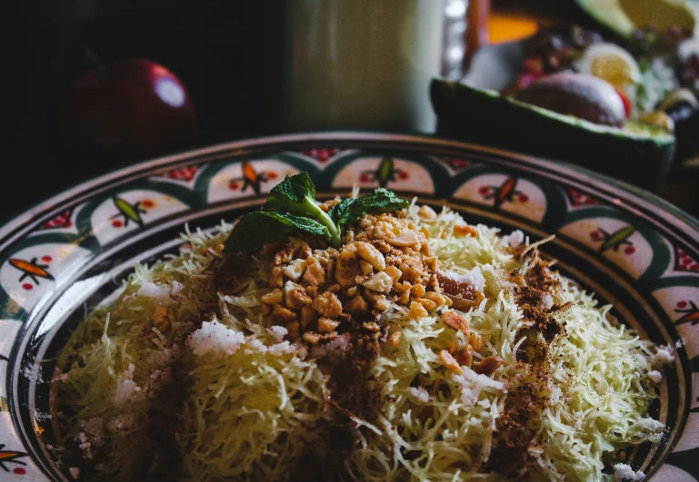 a plate with a bunch of rice and food on it