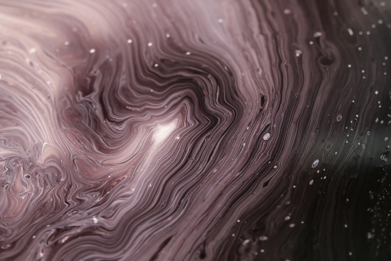 a close up image of water with bubbles on it