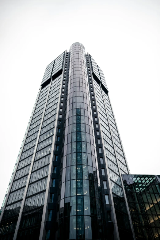 a tall building is shown with several windows
