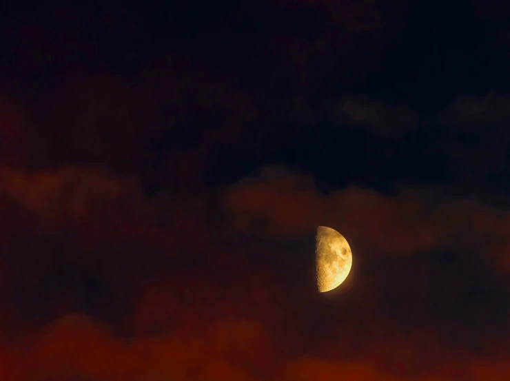 an object is seen through the dark clouds in the sky