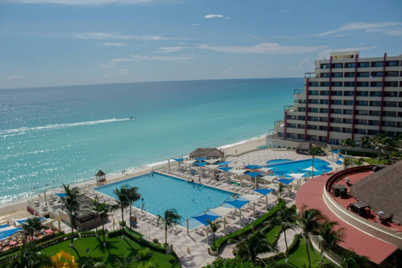 a view of the beach and ocean from a balcony