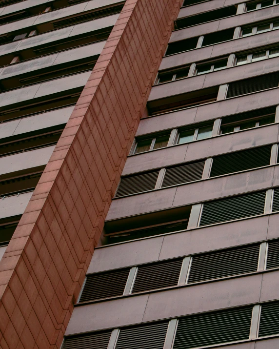 a building with a bird hanging on it