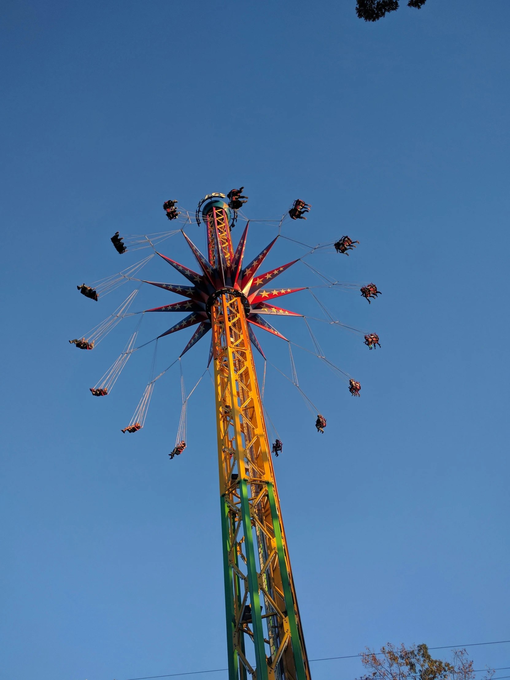 the aerial view of a carnival ride during the day