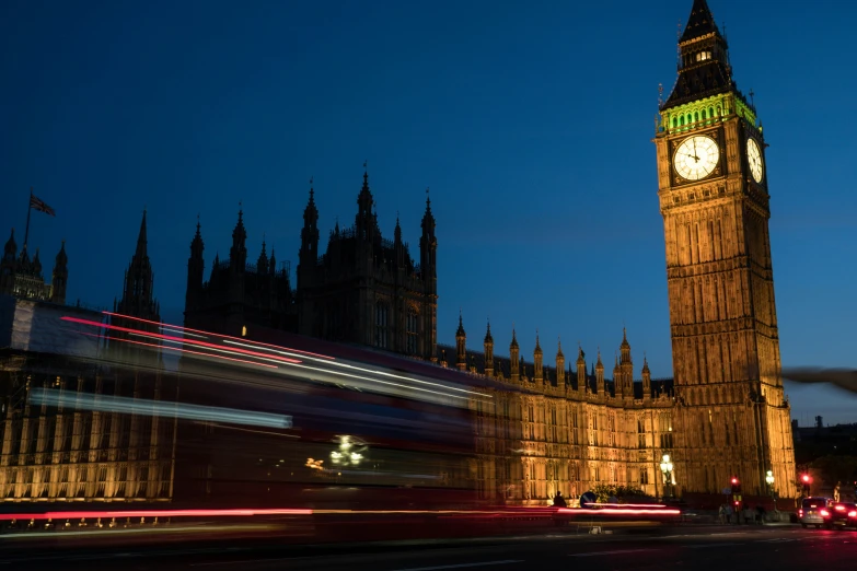 a big tower with a clock on the side of it