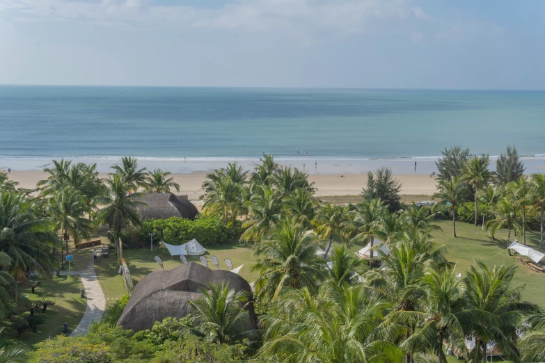 the aerial view from top of a hill overlooking a beach