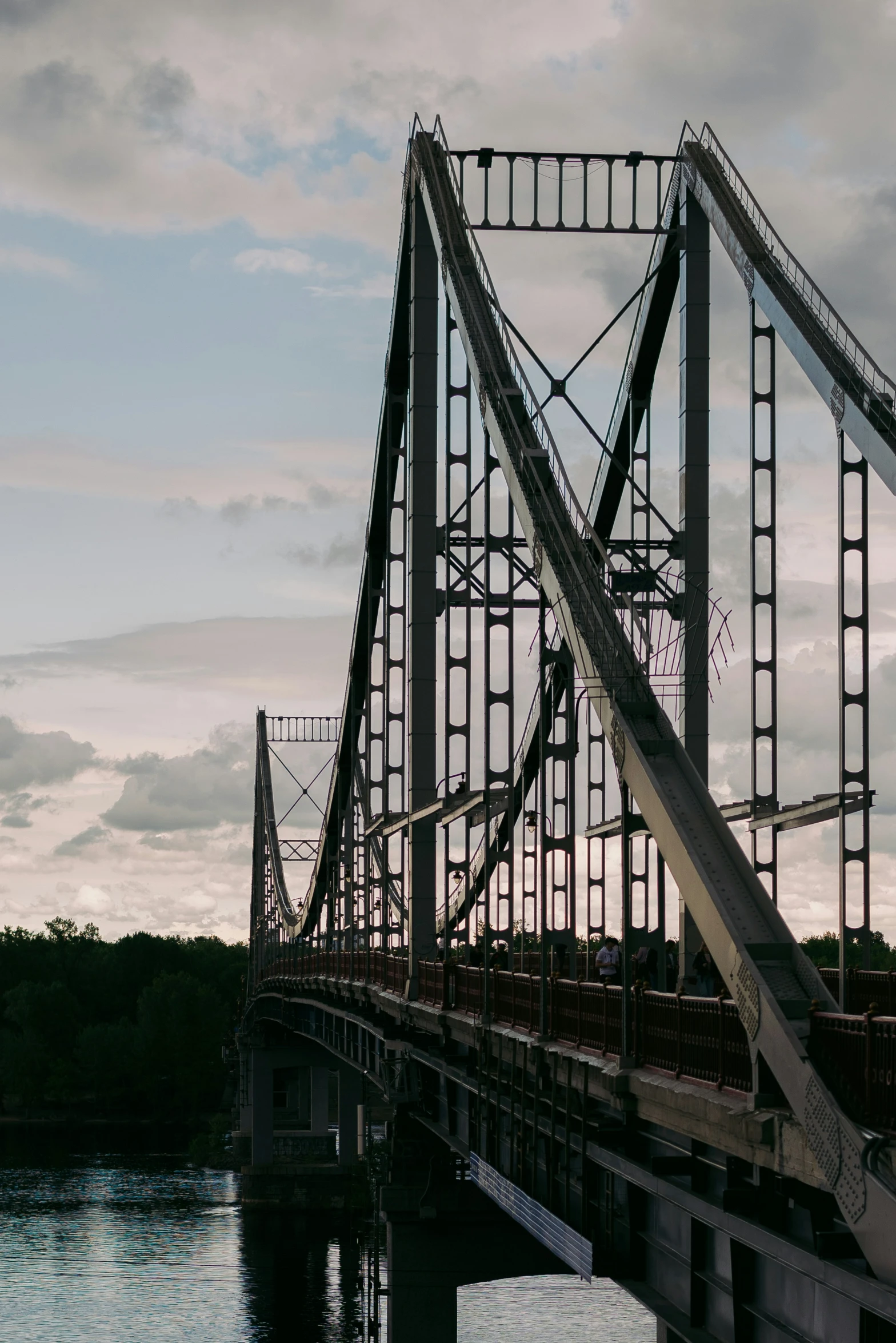 a view of a bridge spanning over a lake