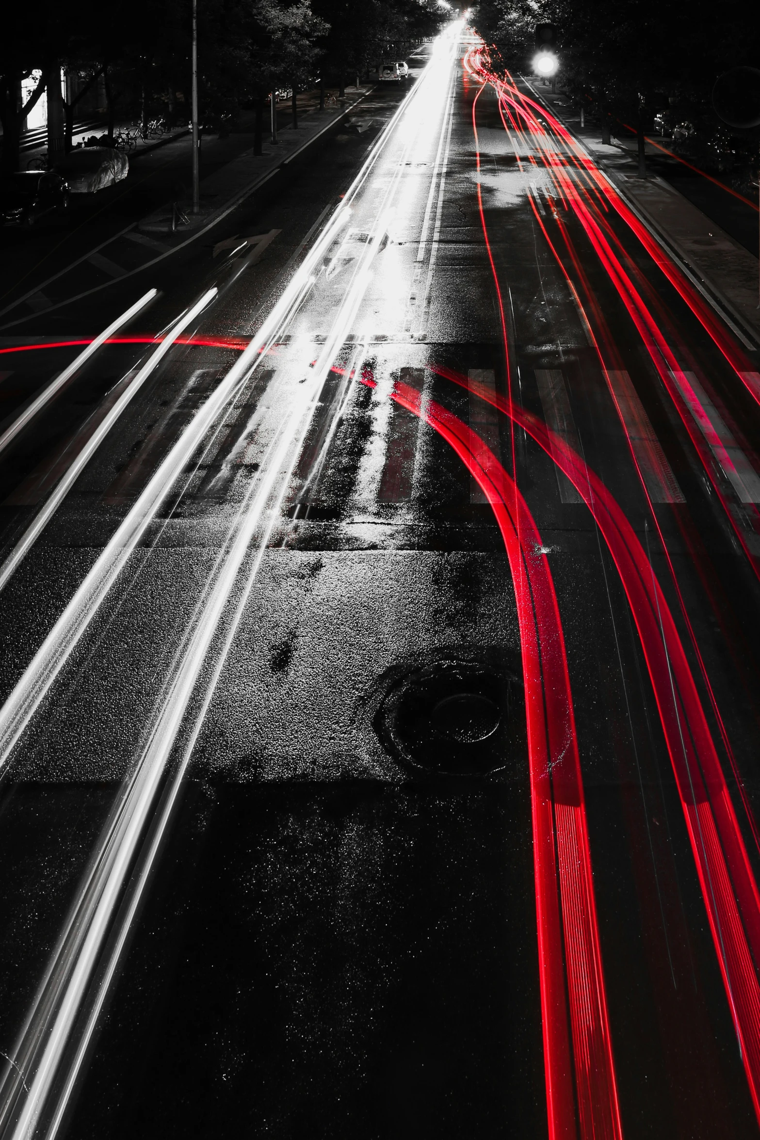 night traffic is shown with streaks of bright lights