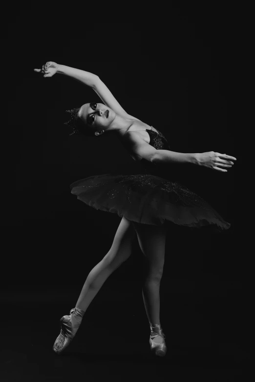 a young ballerina stretches during a po session