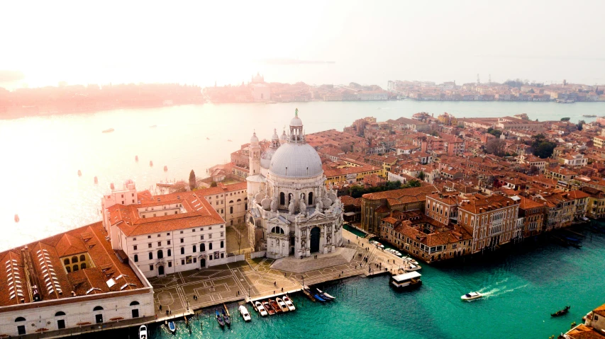 the aerial view shows a city along the water