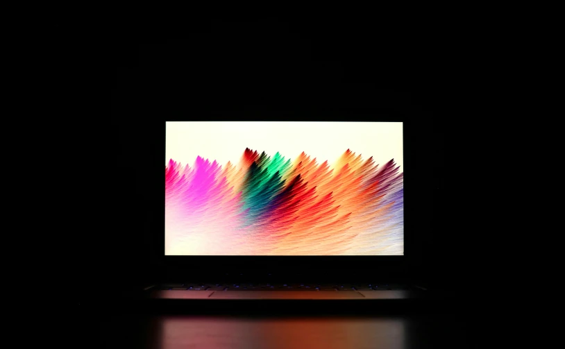 the macbook pro laptop is displaying the new color