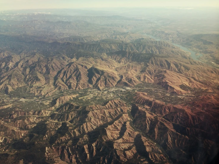 an aerial view of the mountains and valleys