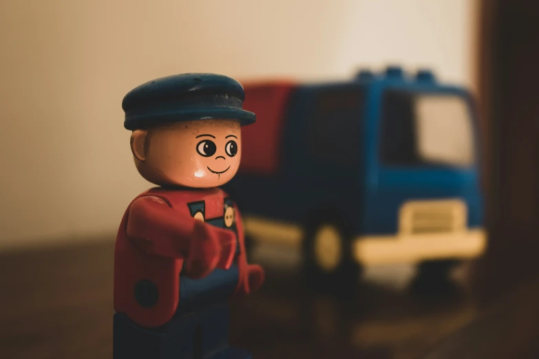 closeup of a toy soldier and toy truck