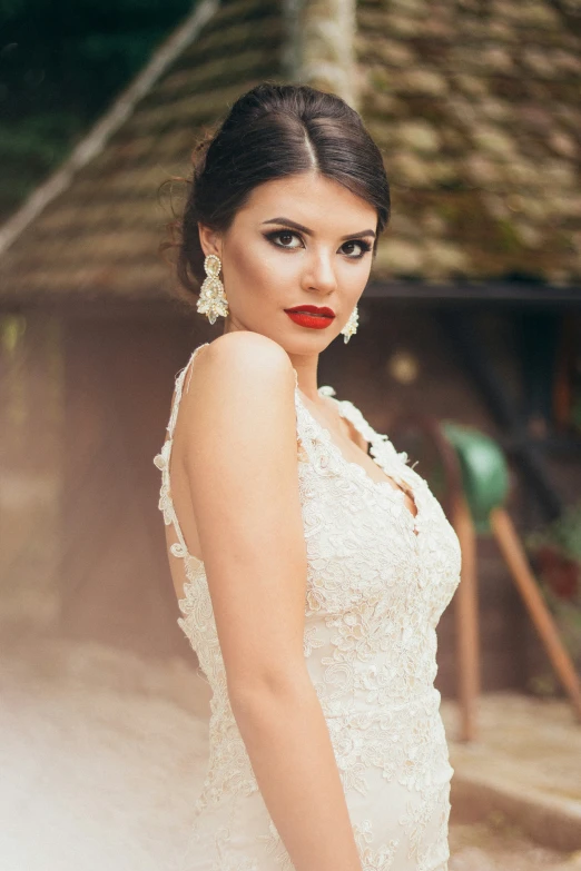 a beautiful young woman in a wedding gown