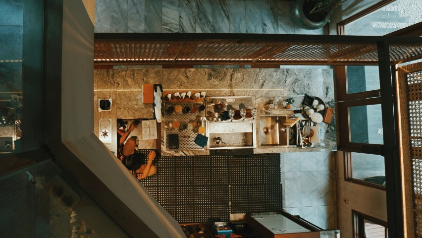 a kitchen area with various appliances and cabinets